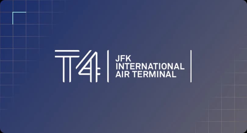 JFK company logo centered on a dark blue grid background.