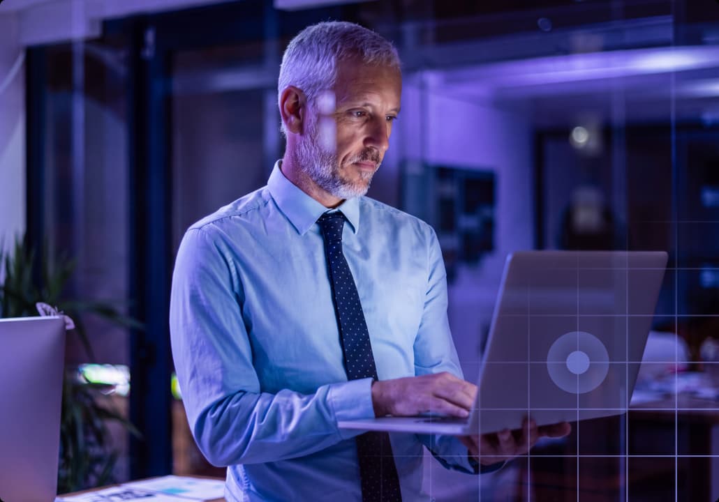 Man looking at a computer