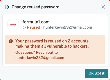 Browser security alert warning that a Formula 1 account (hunterkevin232@gmail.com) uses a reused password across 2 accounts, making them vulnerable to hackers. Includes an "Ok, got it" button.