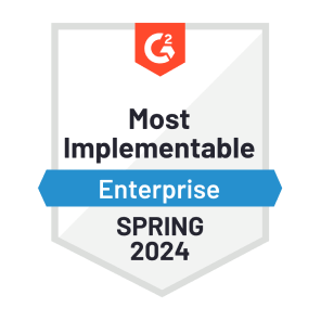 A red, white, and blue graphic of G2’s “Most Implementable - Enterprise” badge that Dashlane was awarded in spring 2024