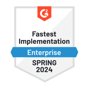A red, blue, and white graphic of G2’s “Fastest Implementation - Enterprise” badge that Dashlane was awarded in spring 2024