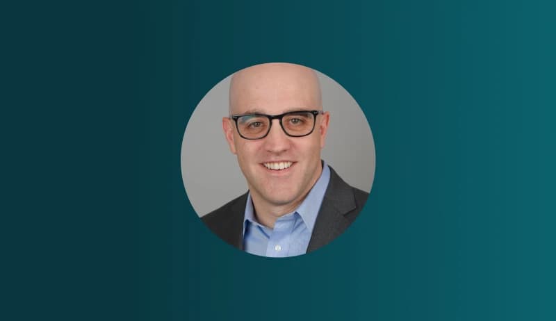 This image shows the headshot of Rob Black, the speaker for the webinar about AI helping or hindering cybersecurity.