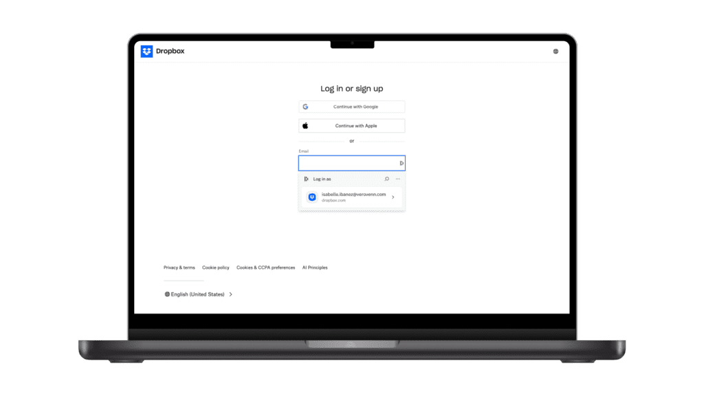 Image of a computer with the Dropbox login page on the screen and a small Dashlane pop-up suggesting the user's Dropbox credentials.