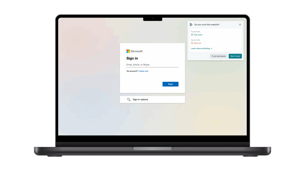 A laptop shows the Microsoft login screen with an AI phishing alert from Dashlane on the top right. The alert says “Do you trust this website?” and lists the trusted URL and current URL. At the bottom, there’s a “trust and paste” button and a “don’t trust” button.